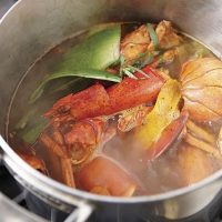 The 7 Seas of Seafood 9 A chef making a pot of Lobster Stock