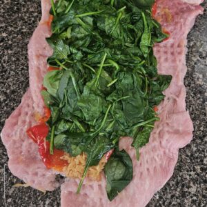 The #1 Ranked Pork and Sauerkraut Recipe 4 top with wilted spinach